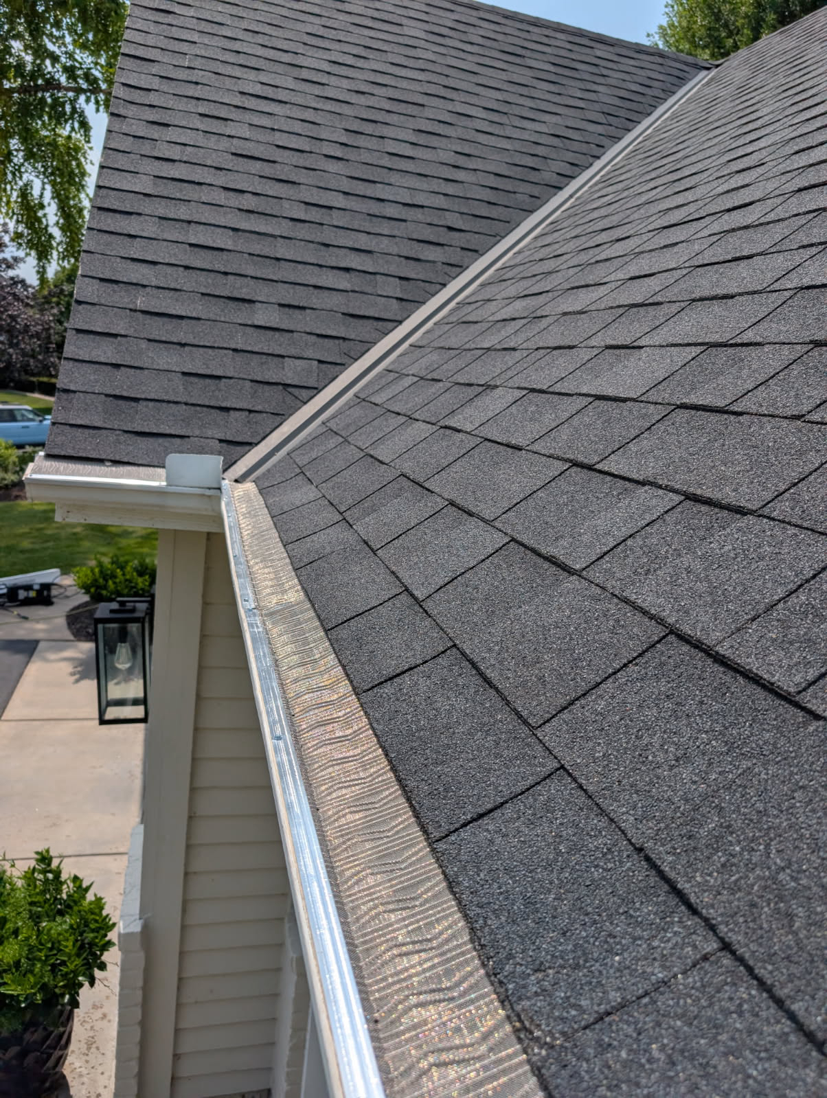 Seamless gutters with gutter guards